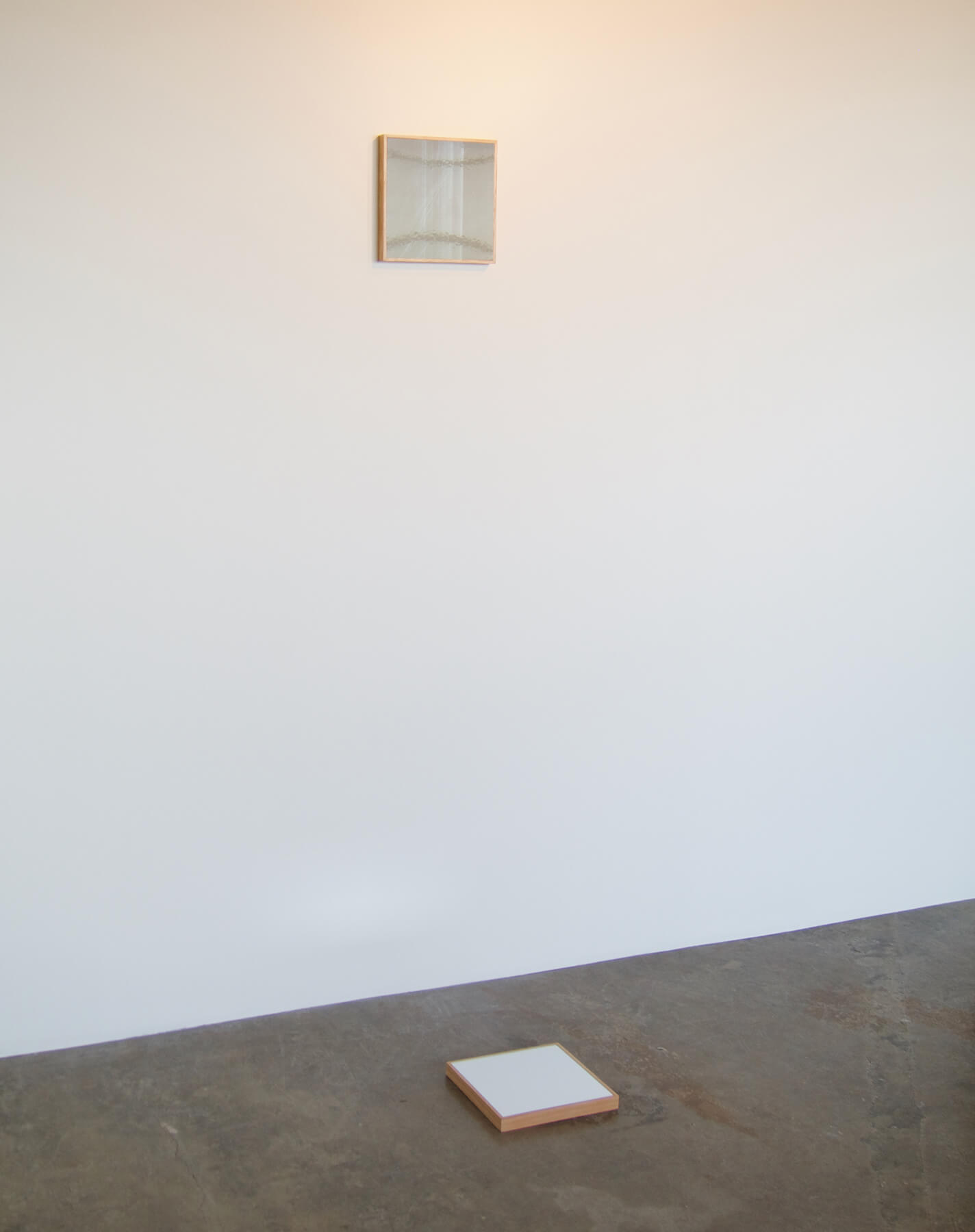 The beginning of religious feeling, Mirror, prismatic film, wood, 8 ½ in x 8 ½ in x 5 ft 7 in, 2013